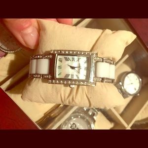 Anne Klein mother of pearl in white ceramic watch.